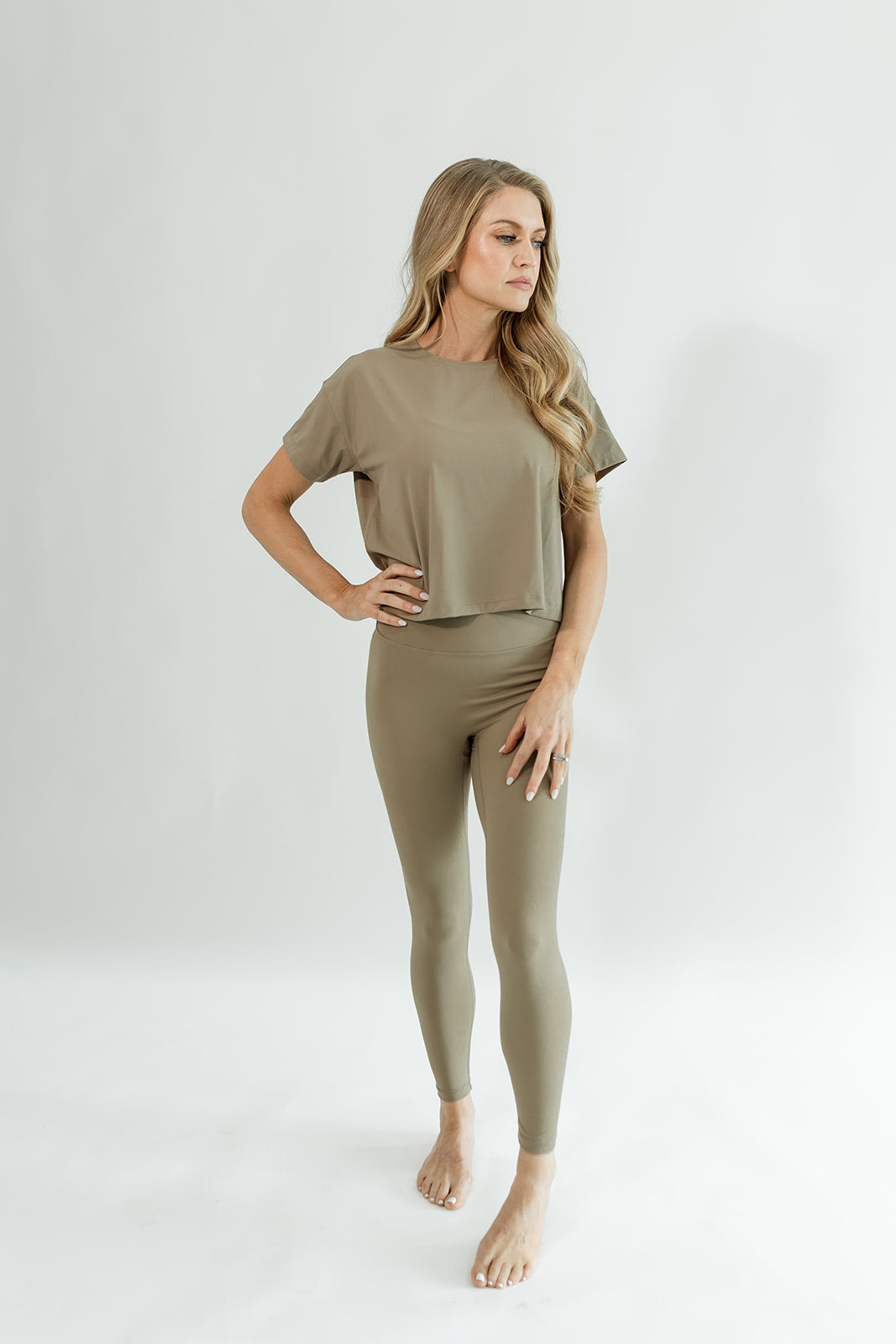 Sand/tan cropped flight tee paired with Volare leggings