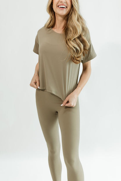 sand/tan lightweight cropped flight tee paired with Volare leggings